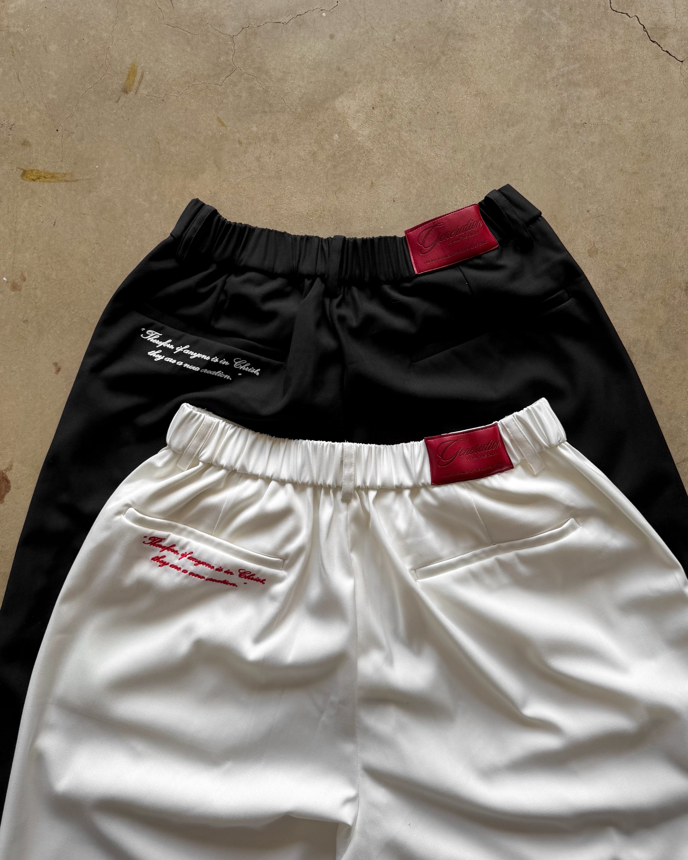 "IDENTITY" WHITE PLEATED PANTS