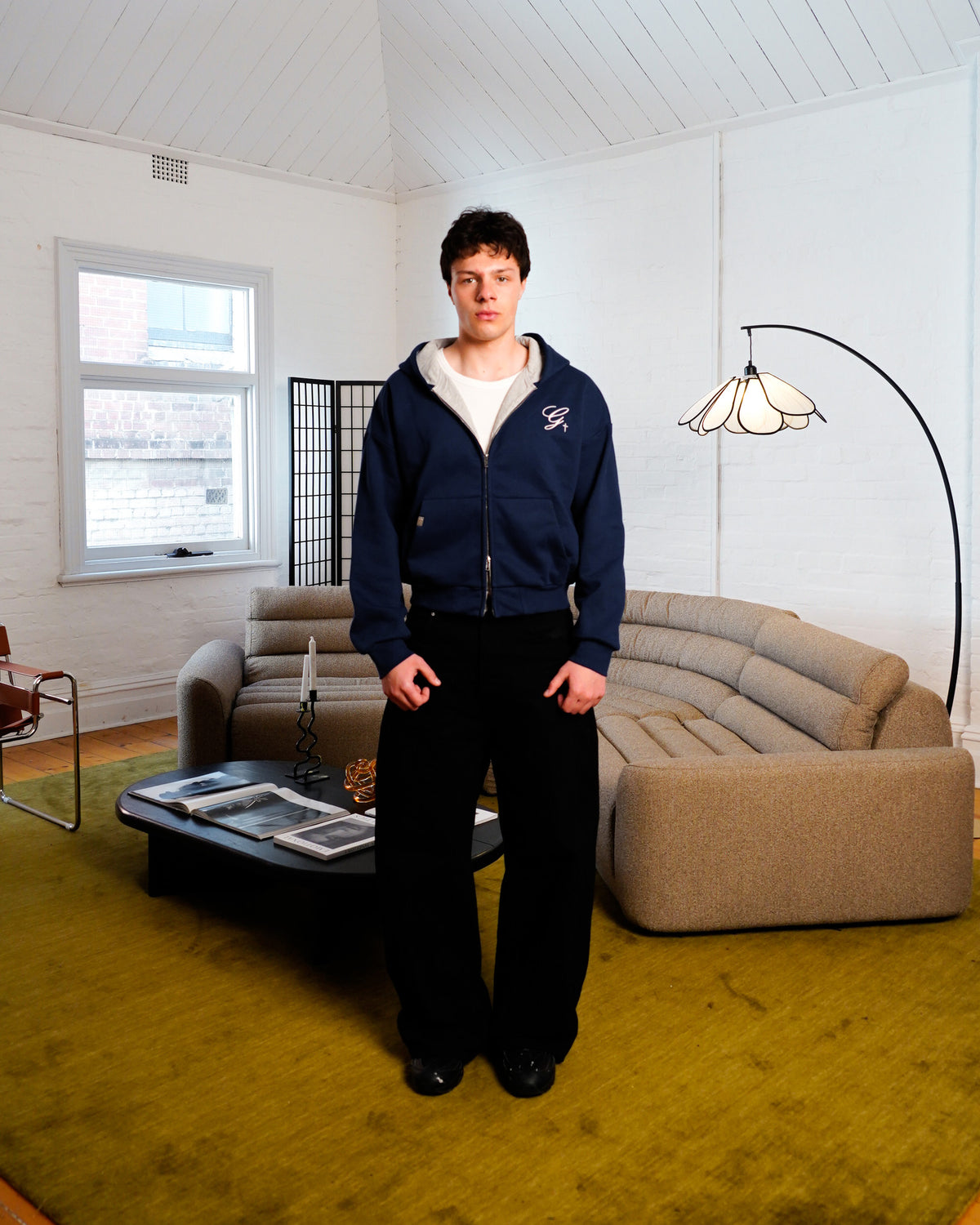 CHILD OF GOD - NAVY ZIP-UP HOODIE on model front