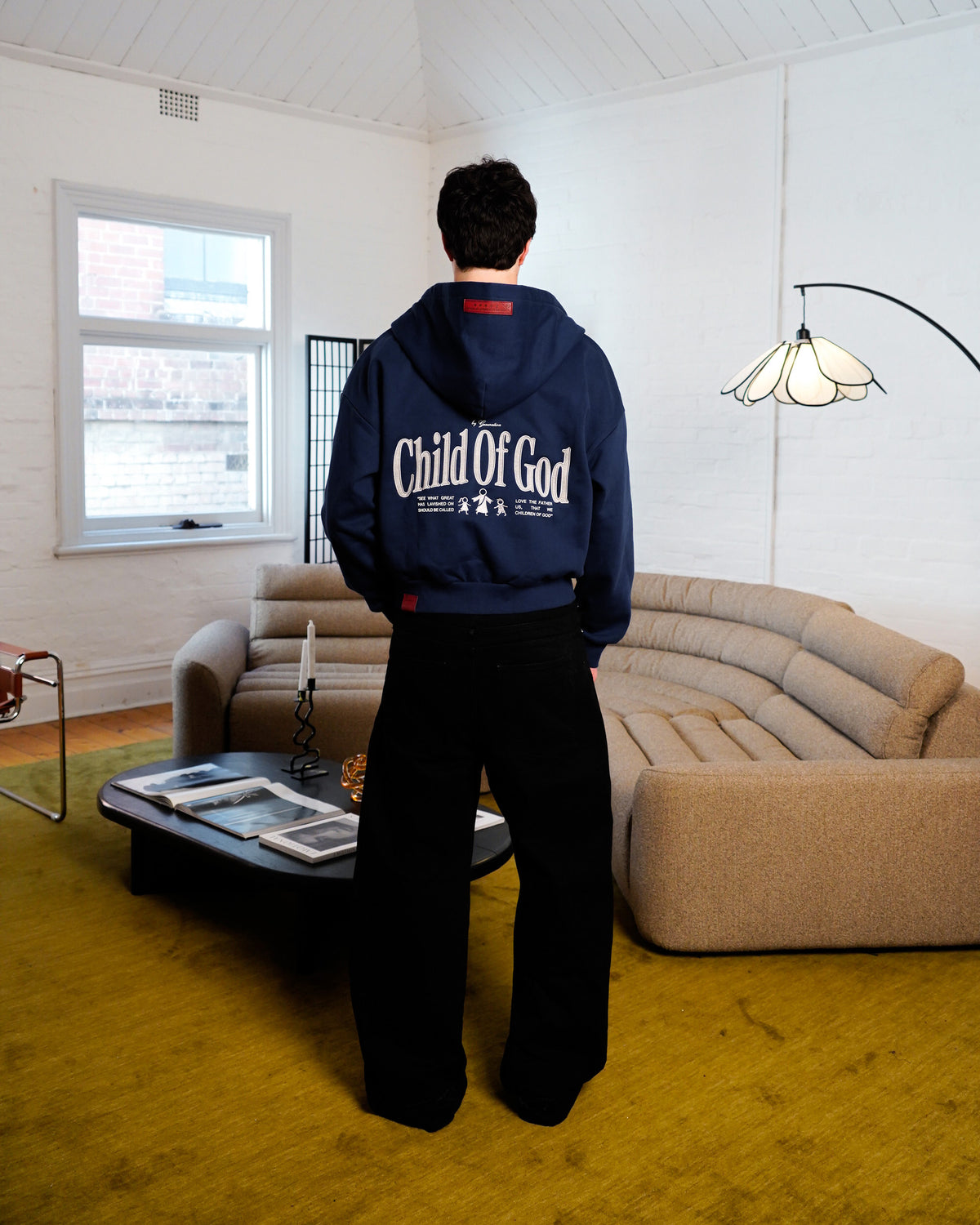 CHILD OF GOD - NAVY ZIP-UP HOODIE on model back
