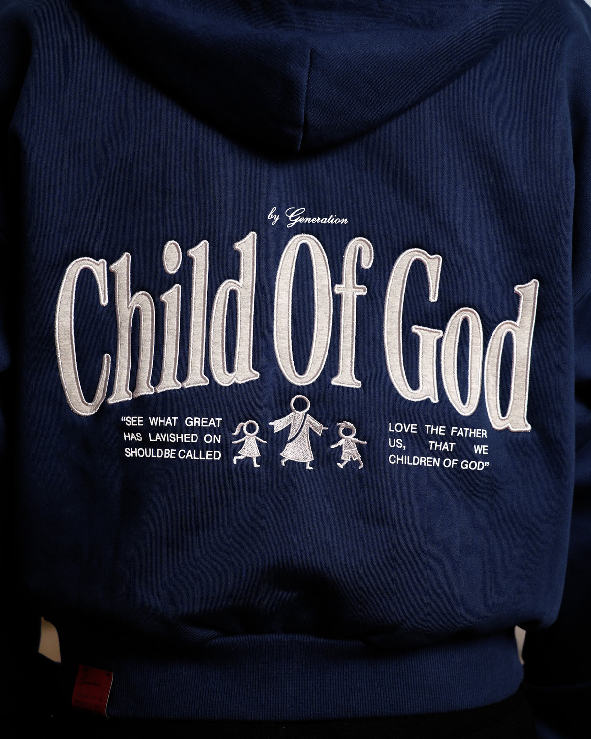 CHILD OF GOD - NAVY ZIP-UP HOODIE back embroidery close-up